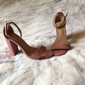 Pink ankle strap heels.